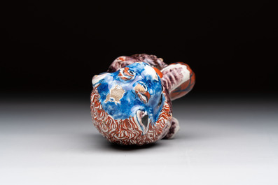A polychrome Dutch Delft model of a lion, 18th C.