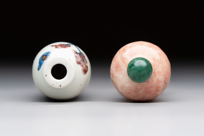 A Chinese peachbloom-crackle-glazed 'meiping' snuff bottle and a figural blue, white and copper-red snuff bottle, Yongzheng mark, 19th C.