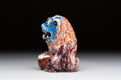A polychrome Dutch Delft model of a lion, 18th C.