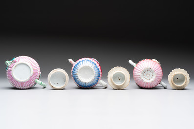 A group of five Chinese famille rose teapots and covers and three stands, Yongzheng/Qianlong