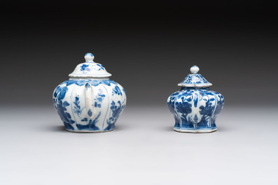 A varied collection of eight Chinese blue and white vases, two teapots and two loving cups, Kangxi/Qianlong