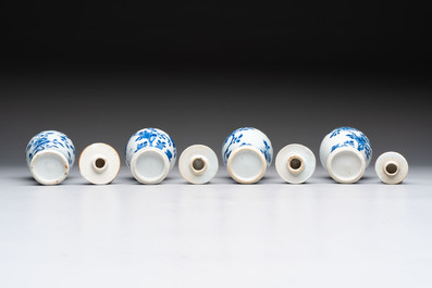 A varied collection of eight Chinese blue and white vases, two teapots and two loving cups, Kangxi/Qianlong