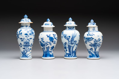 A varied collection of eight Chinese blue and white vases, two teapots and two loving cups, Kangxi/Qianlong