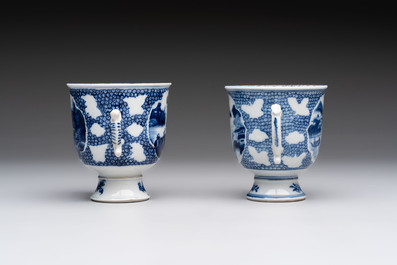 A varied collection of eight Chinese blue and white vases, two teapots and two loving cups, Kangxi/Qianlong