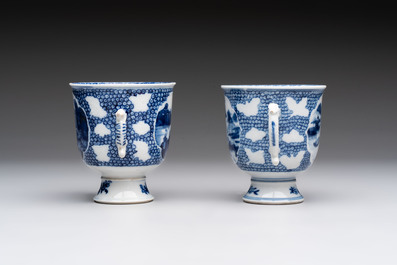 A varied collection of eight Chinese blue and white vases, two teapots and two loving cups, Kangxi/Qianlong