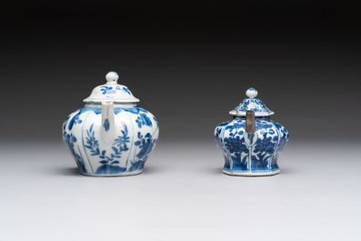 A varied collection of eight Chinese blue and white vases, two teapots and two loving cups, Kangxi/Qianlong