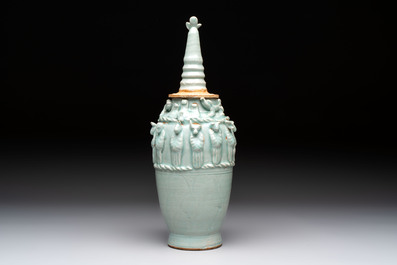 A Chinese qingbai-glazed covered urn applied with zodiac figures, Song