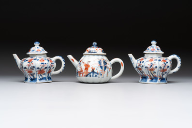 Three Chinese Imari-style teapots and two blue and white jugs, Kangxi