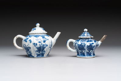 A varied collection of eight Chinese blue and white vases, two teapots and two loving cups, Kangxi/Qianlong
