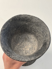 A massive Ban Chiang culture pottery vessel and two grey pottery jars, Thailand 7/4th C. B.C.