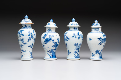 A varied collection of eight Chinese blue and white vases, two teapots and two loving cups, Kangxi/Qianlong