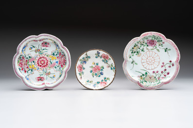 A group of five Chinese famille rose teapots and covers and three stands, Yongzheng/Qianlong