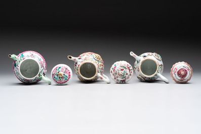 A group of five Chinese famille rose teapots and covers and three stands, Yongzheng/Qianlong
