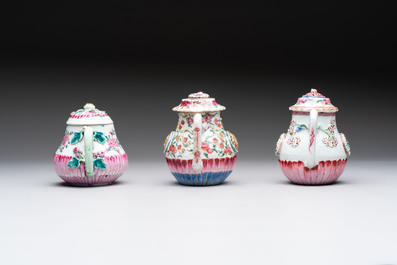 A group of five Chinese famille rose teapots and covers and three stands, Yongzheng/Qianlong
