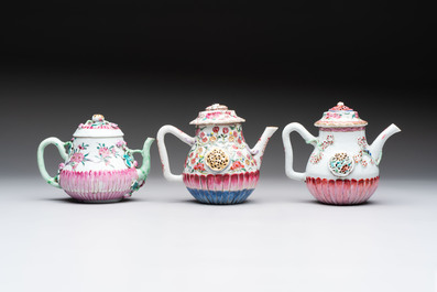 A group of five Chinese famille rose teapots and covers and three stands, Yongzheng/Qianlong
