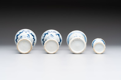 A varied collection of eight Chinese blue and white vases, two teapots and two loving cups, Kangxi/Qianlong