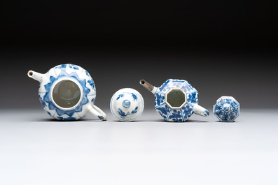 A varied collection of eight Chinese blue and white vases, two teapots and two loving cups, Kangxi/Qianlong