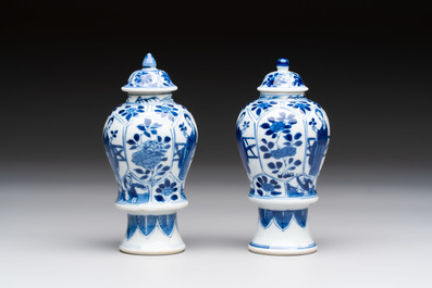 A pair of Chinese blue and white 'Long Eliza and playing boys' covered vases, Kangxi