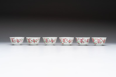 A set of six Chinese famille rose 'peacock' cups and saucers, Yongzheng