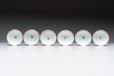 A set of six Chinese famille rose 'peacock' cups and saucers, Yongzheng
