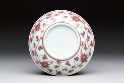 A Chinese copper-red plate with figural design, possibly Ming