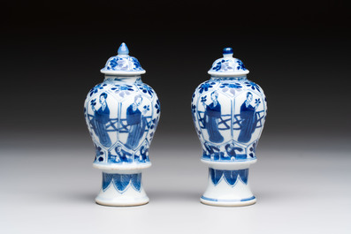 A pair of Chinese blue and white 'Long Eliza and playing boys' covered vases, Kangxi