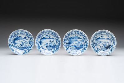 A set of 11 Chinese blue and white cups and saucers with riverscape design, Kangxi
