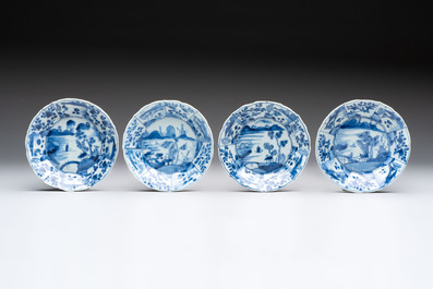 A set of 11 Chinese blue and white cups and saucers with riverscape design, Kangxi