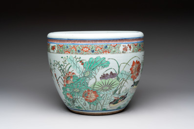 A Chinese famille rose 'mandarin ducks in a lotus pond' scroll pot, 19th C.