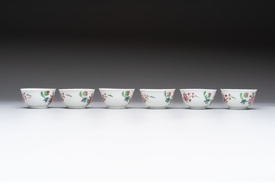 A set of six Chinese famille rose 'peacock' cups and saucers, Yongzheng
