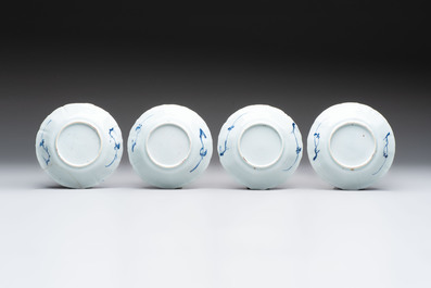 A set of 11 Chinese blue and white cups and saucers with riverscape design, Kangxi
