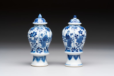 A pair of Chinese blue and white 'Long Eliza and playing boys' covered vases, Kangxi