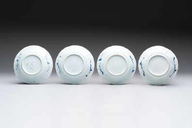 A set of 11 Chinese blue and white cups and saucers with riverscape design, Kangxi