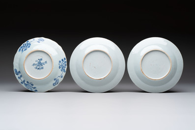 Nine Chinese blue and white plates with figural design, 18th C.