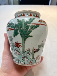 A small Chinese wucai jar with ladies and boys in a landscape, Transitional period