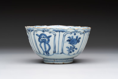 Five Chinese blue and white 'kraak' and 'kraak'-style plates, a saucer and a bowl, Ming/Qing