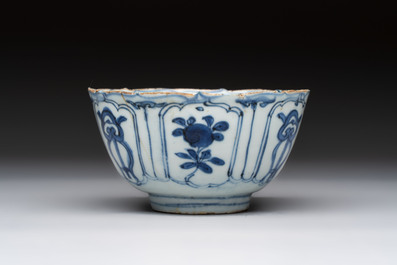 Five Chinese blue and white 'kraak' and 'kraak'-style plates, a saucer and a bowl, Ming/Qing