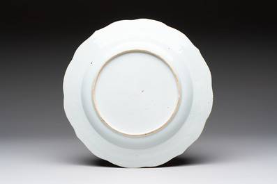 Two Chinese armorial plates and a saucer with the arms of Zur Megede, Rhenius and Chute, Qianlong