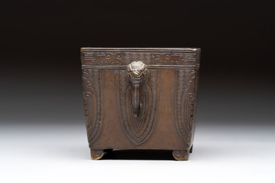 A Chinese archaistic bronze square censer with two handles, Xuande mark, Qing