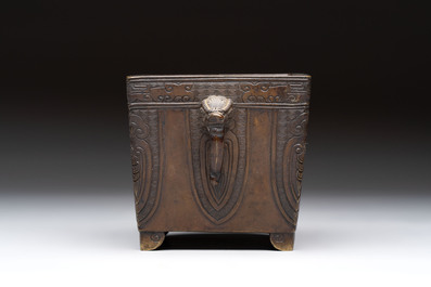 A Chinese archaistic bronze square censer with two handles, Xuande mark, Qing