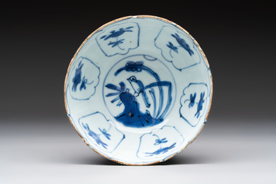 Five Chinese blue and white 'kraak' and 'kraak'-style plates, a saucer and a bowl, Ming/Qing