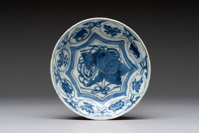 Five Chinese blue and white 'kraak' and 'kraak'-style plates, a saucer and a bowl, Ming/Qing