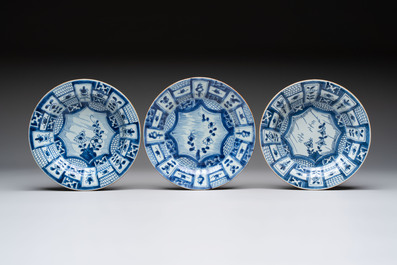 Five Chinese blue and white 'kraak' and 'kraak'-style plates, a saucer and a bowl, Ming/Qing
