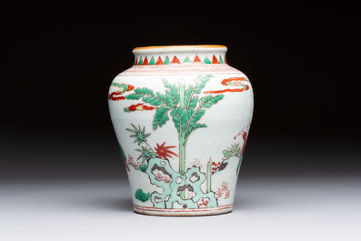 A small Chinese wucai jar with ladies and boys in a landscape, Transitional period