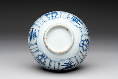 Five Chinese blue and white 'kraak' and 'kraak'-style plates, a saucer and a bowl, Ming/Qing