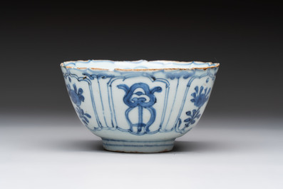 Five Chinese blue and white 'kraak' and 'kraak'-style plates, a saucer and a bowl, Ming/Qing