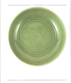 A rare and large Chinese Longquan celadon 'lotus bouquet' dish, Ming, early 15th C.