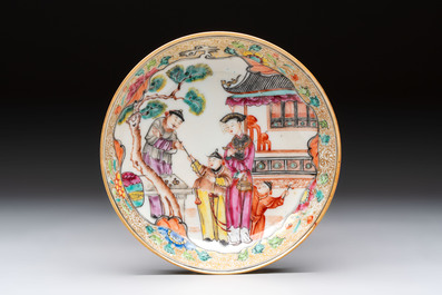 A Chinese Canton famille rose gilt-decorated covered cup and saucer, Qianlong