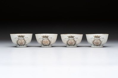 Four Chinese grisaille and gilt-decorated monogrammed cups and saucers, Qianlong, dated 1778