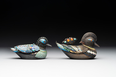 Two Chinese enamelled filigree silver mandarin duck-form boxes and covers inset with precious stones, 19/20th C.